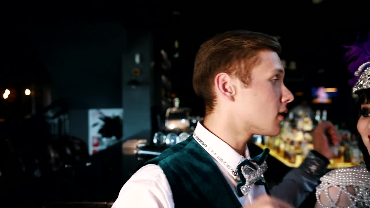 Stock Video People Wearing Retro Party Costumes In A Bar Live Wallpaper - Free Download