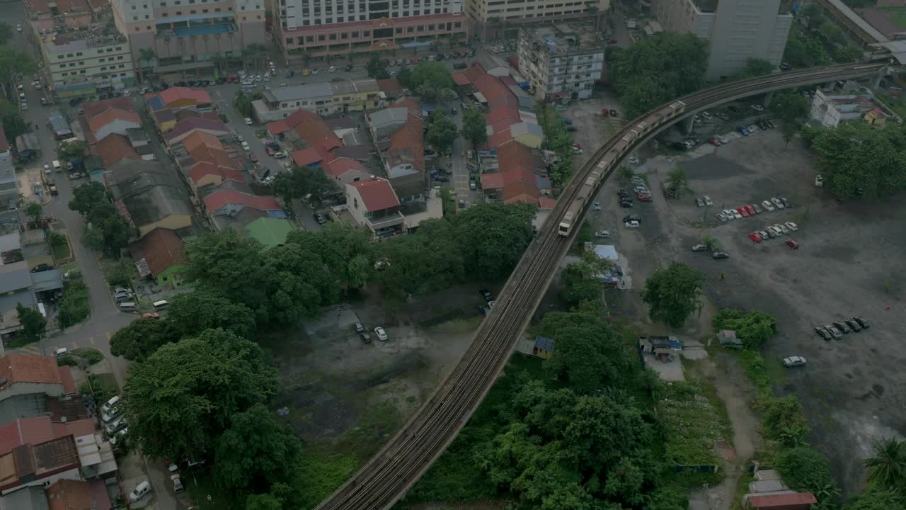 Free Video Stock train heading above a poor residential area Live Wallpaper - Free Download