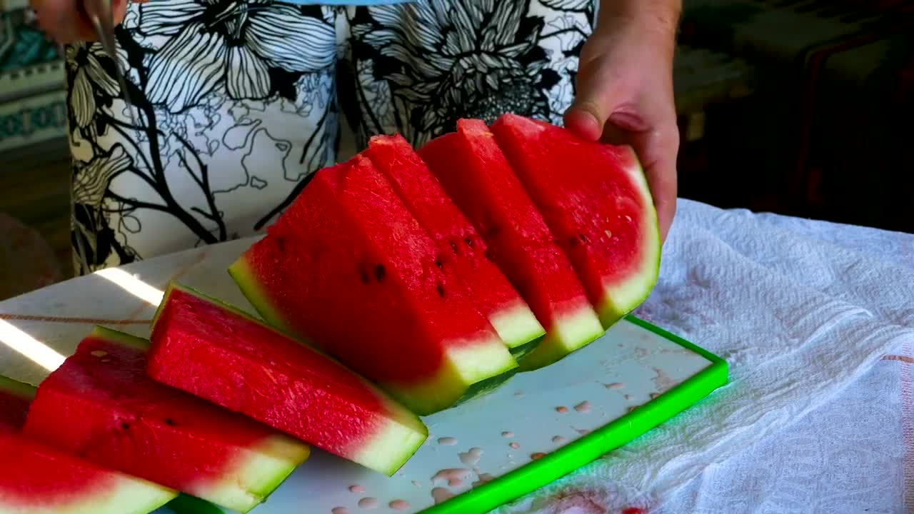 Stock Video Cutting A Watermelon With A Knife Live Wallpaper For PC - Free Download
