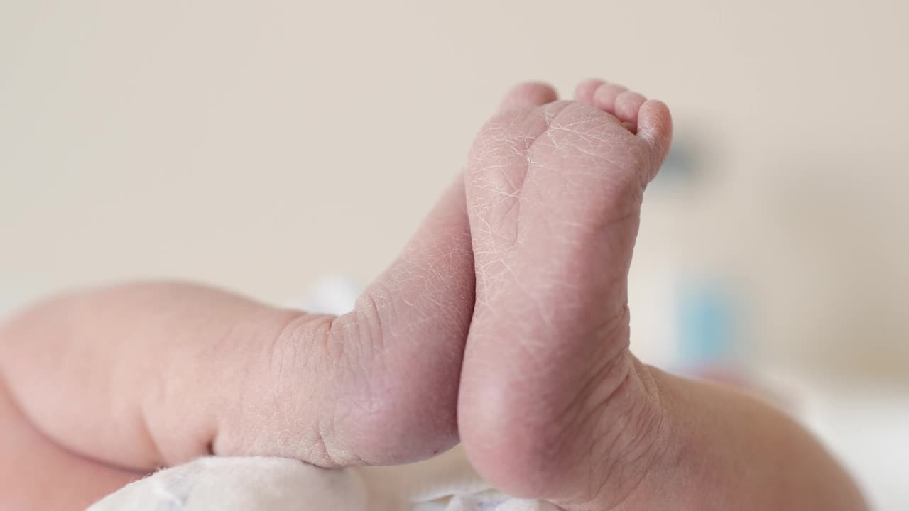 Stock Video Newborn Baby Laying On A Table Live Wallpaper - Free Download