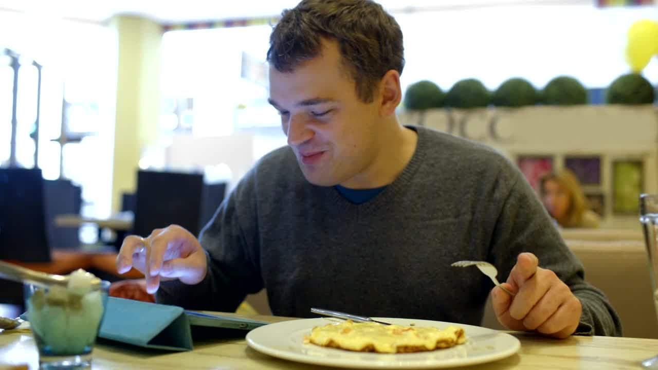 Stock Video Man Smiling As He Types In A Caf Animated Wallpaper - Free Download
