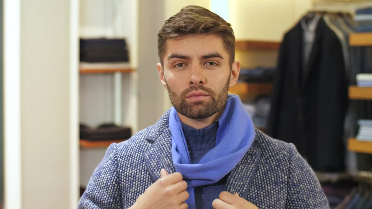 Stock Video Bearded Man Tries On Clothes In The Store Live Wallpaper For PC - Free Download