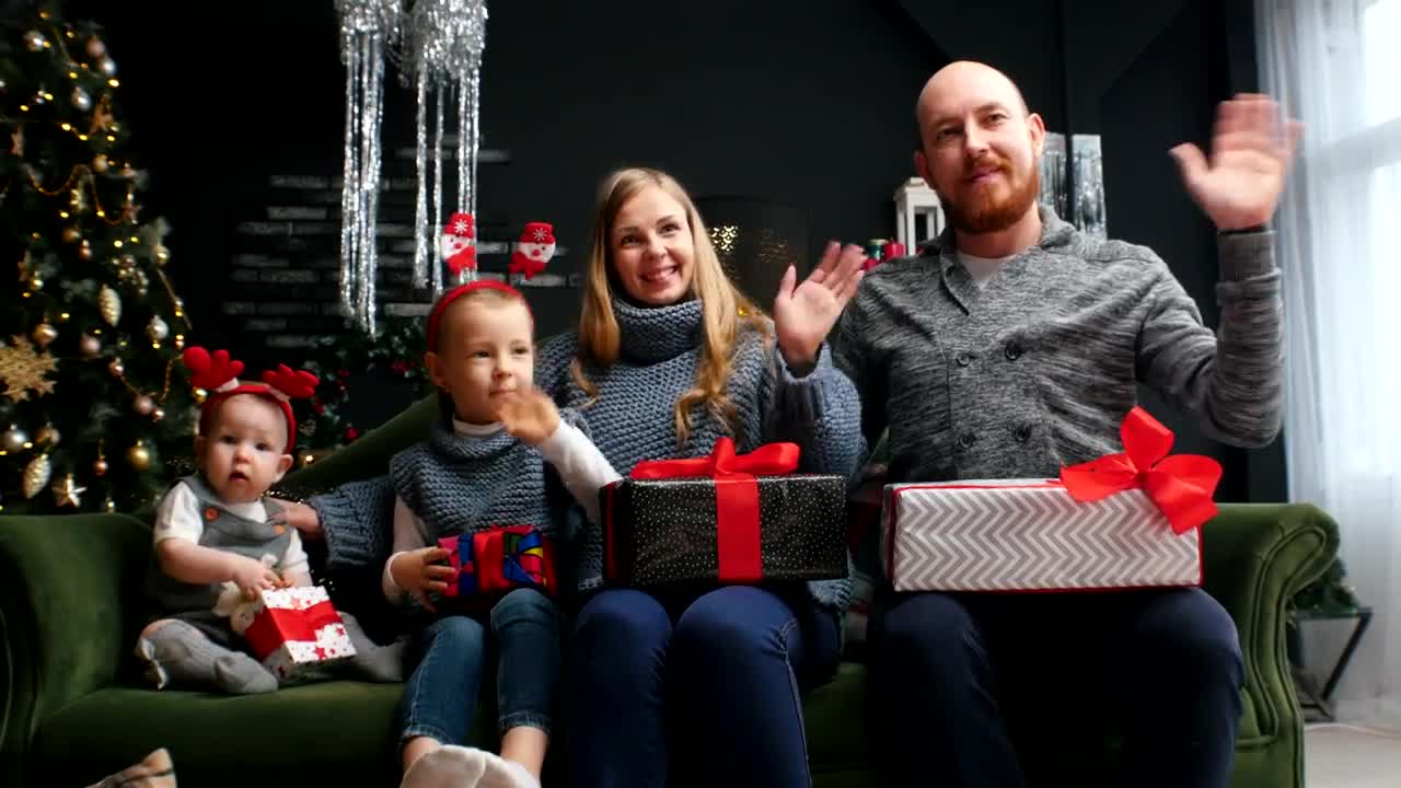 Stock Video Happy Family With Christmas Gifts At Home Animated Wallpaper - Free Download
